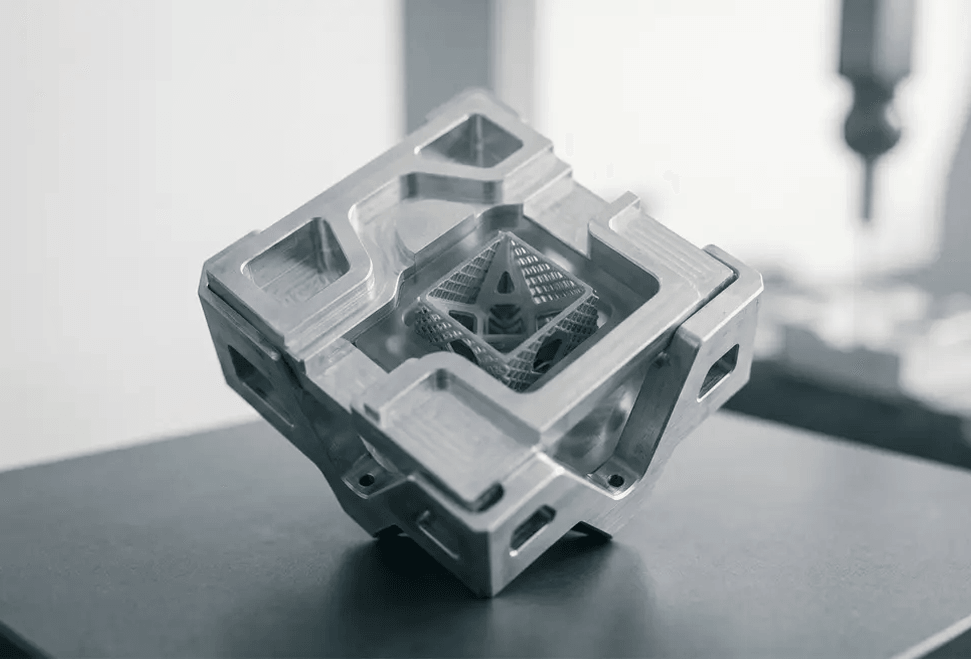 Precision-machined metal assembly with intricate lattice structure on the CIMtech Green Energy manufacturing floor